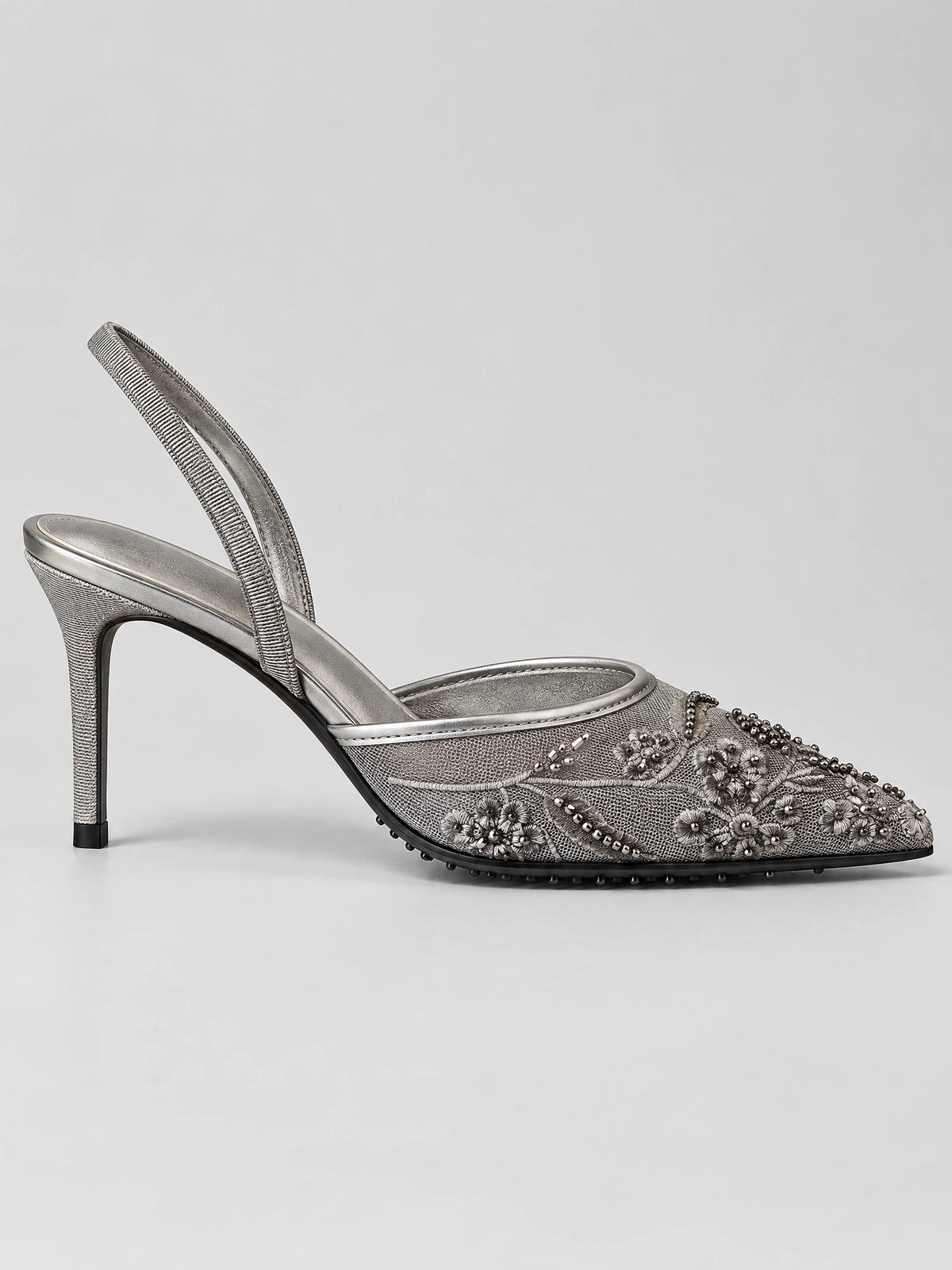 Black Back Strap Slingback High Heels in side view, featuring a pointed toe, high stiletto heel, floral embroidery, and bead detailing.