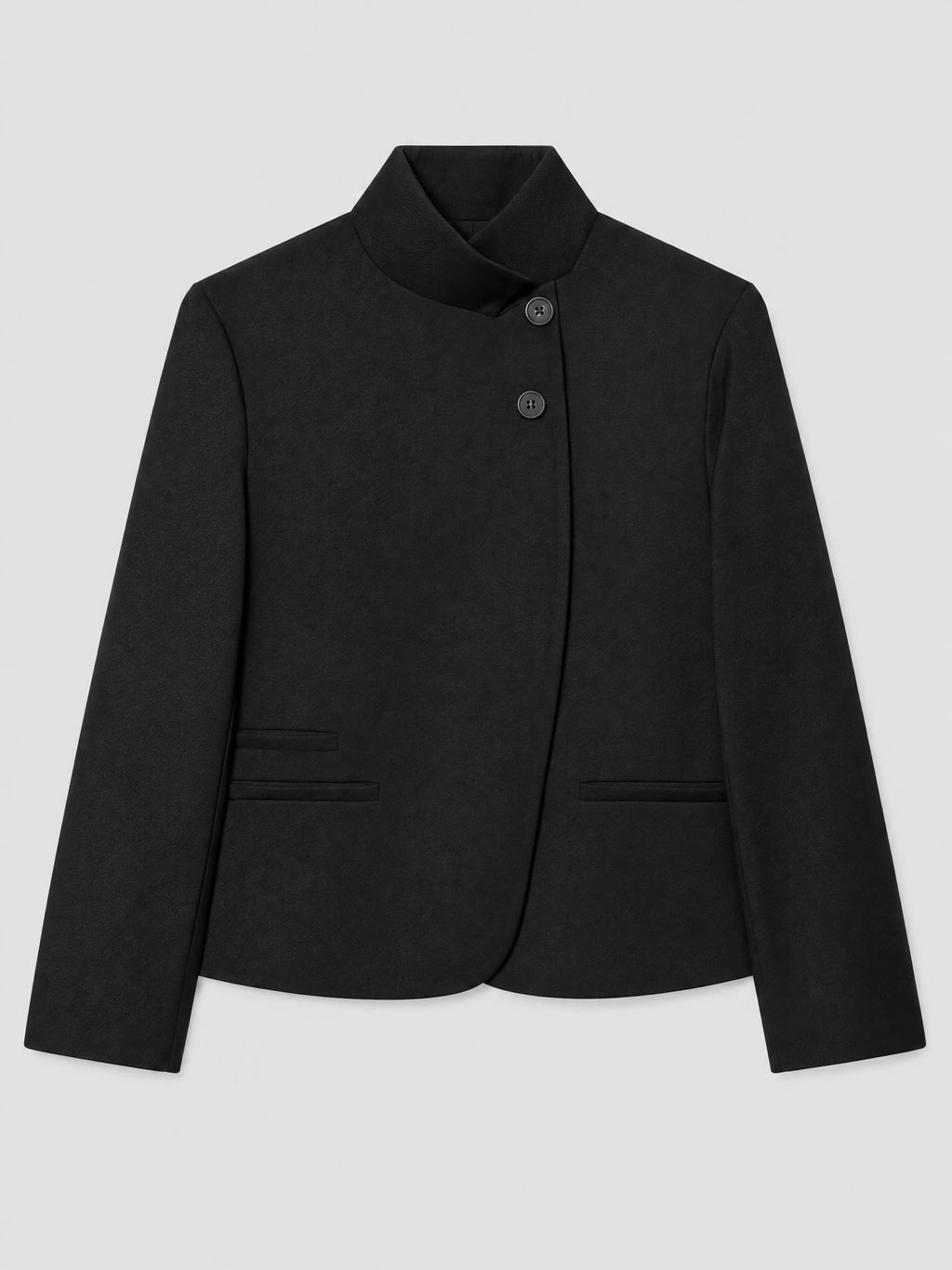 Black Blazer Blouse laid flat, featuring an asymmetrical high collar, two-button front, long sleeves, and welt pockets.