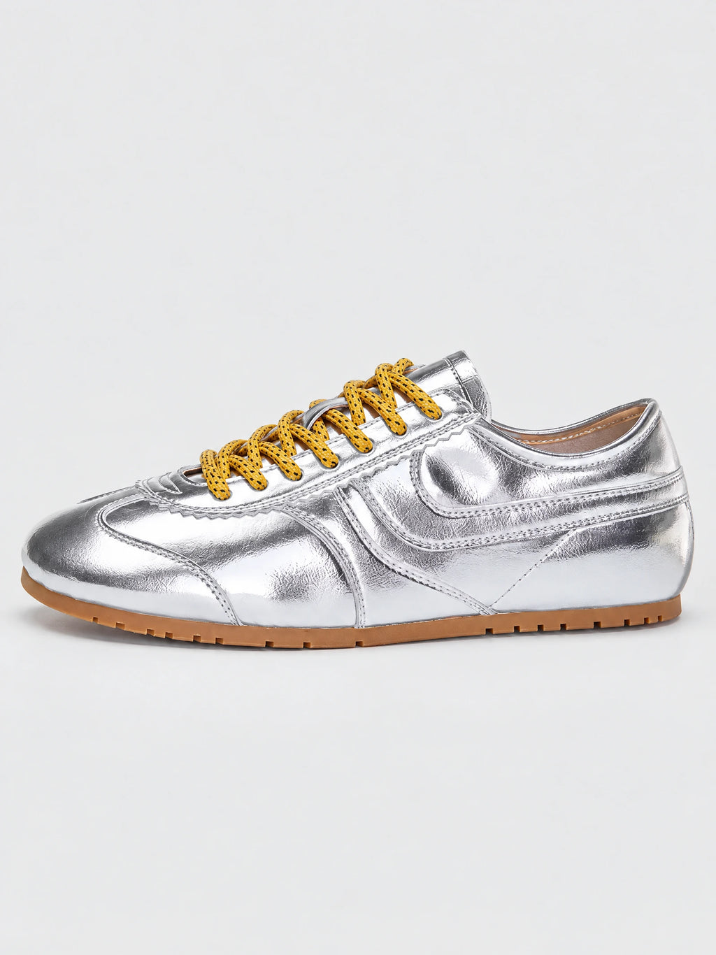 Side view of Gray leather Gats Shoes sneakers with lace-up closure and textured rubber sole.