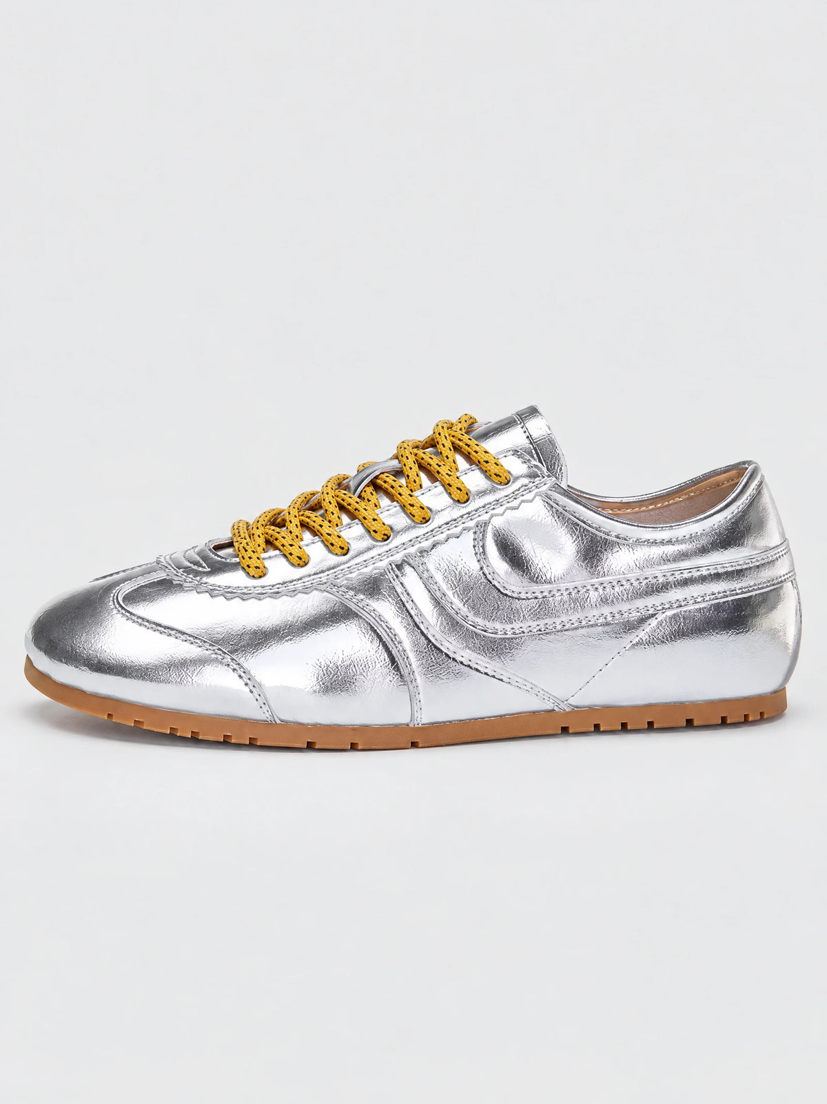 Side view of Gray leather Gats Shoes sneakers with lace-up closure and textured rubber sole.