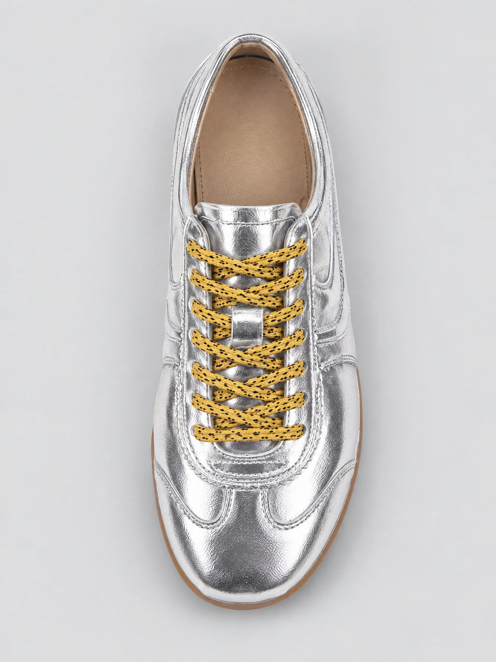 Top-down close-up of a Gray Gats Shoes leather sneaker with textured laces and stitched paneling.