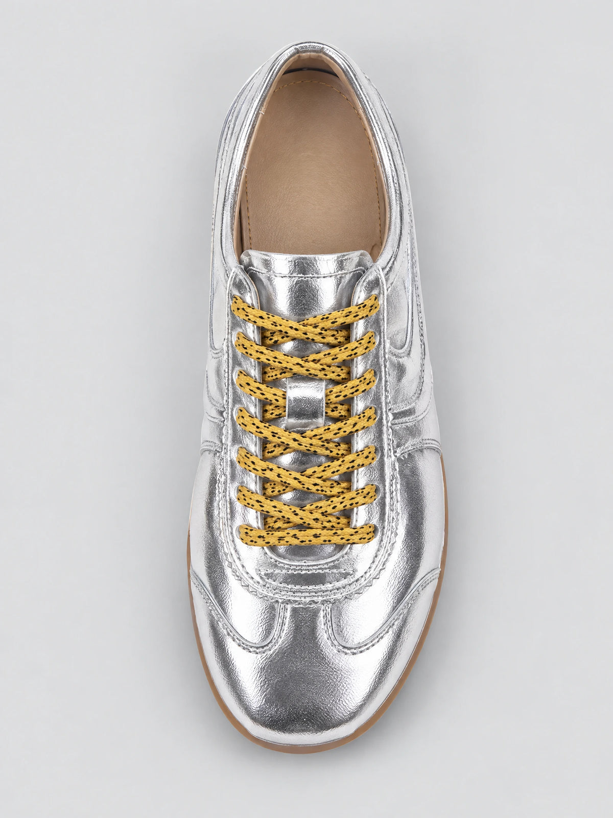 Top-down close-up of a Gray Gats Shoes leather sneaker with textured laces and stitched paneling.