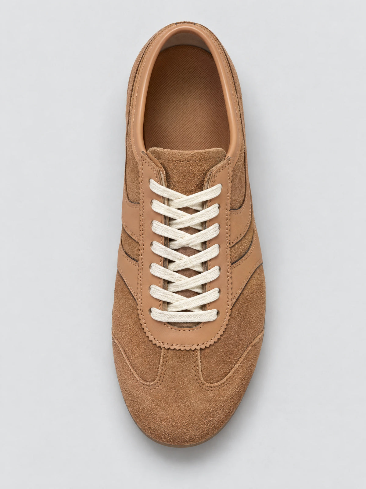 Top-down close-up of a Khaki Gats Shoes sneaker showing the textured leather upper, stitched panels, and lace-up closure.