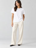 Model wearing a White heavyweight cotton T-shirt with a crew neckline and short sleeves in a front studio view.