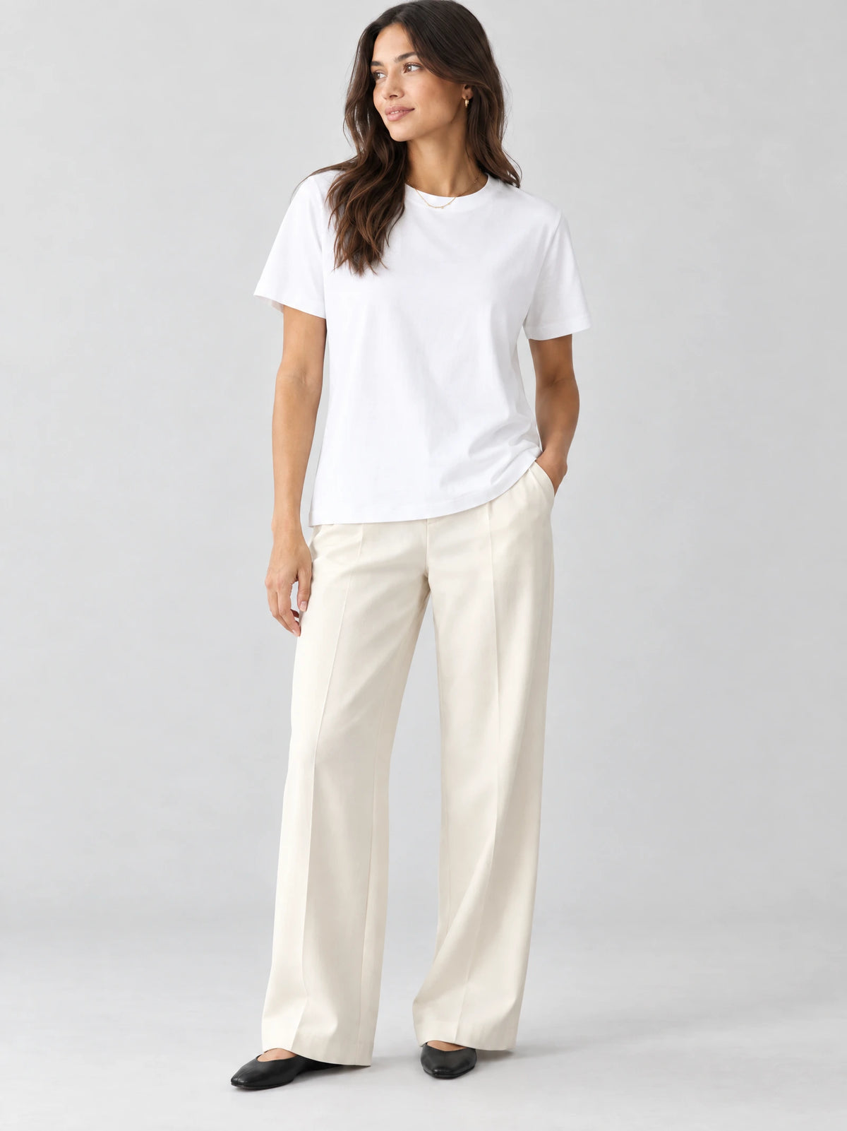 Model wearing a White heavyweight cotton T-shirt with a crew neckline and short sleeves in a front studio view.