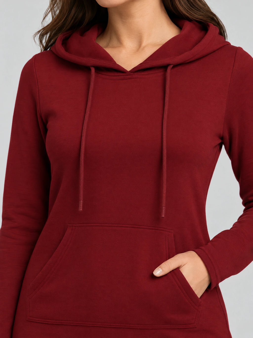 Close-up of the Red cotton Hooded Dress showing the drawstring hood and kangaroo pocket.