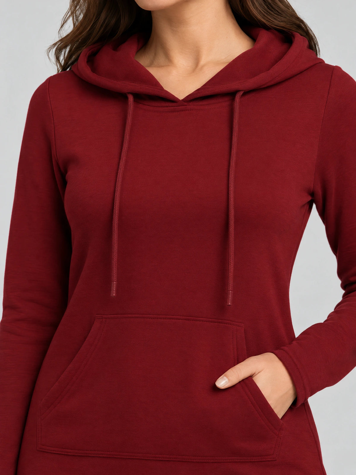 Close-up of the Red cotton Hooded Dress showing the drawstring hood and kangaroo pocket.