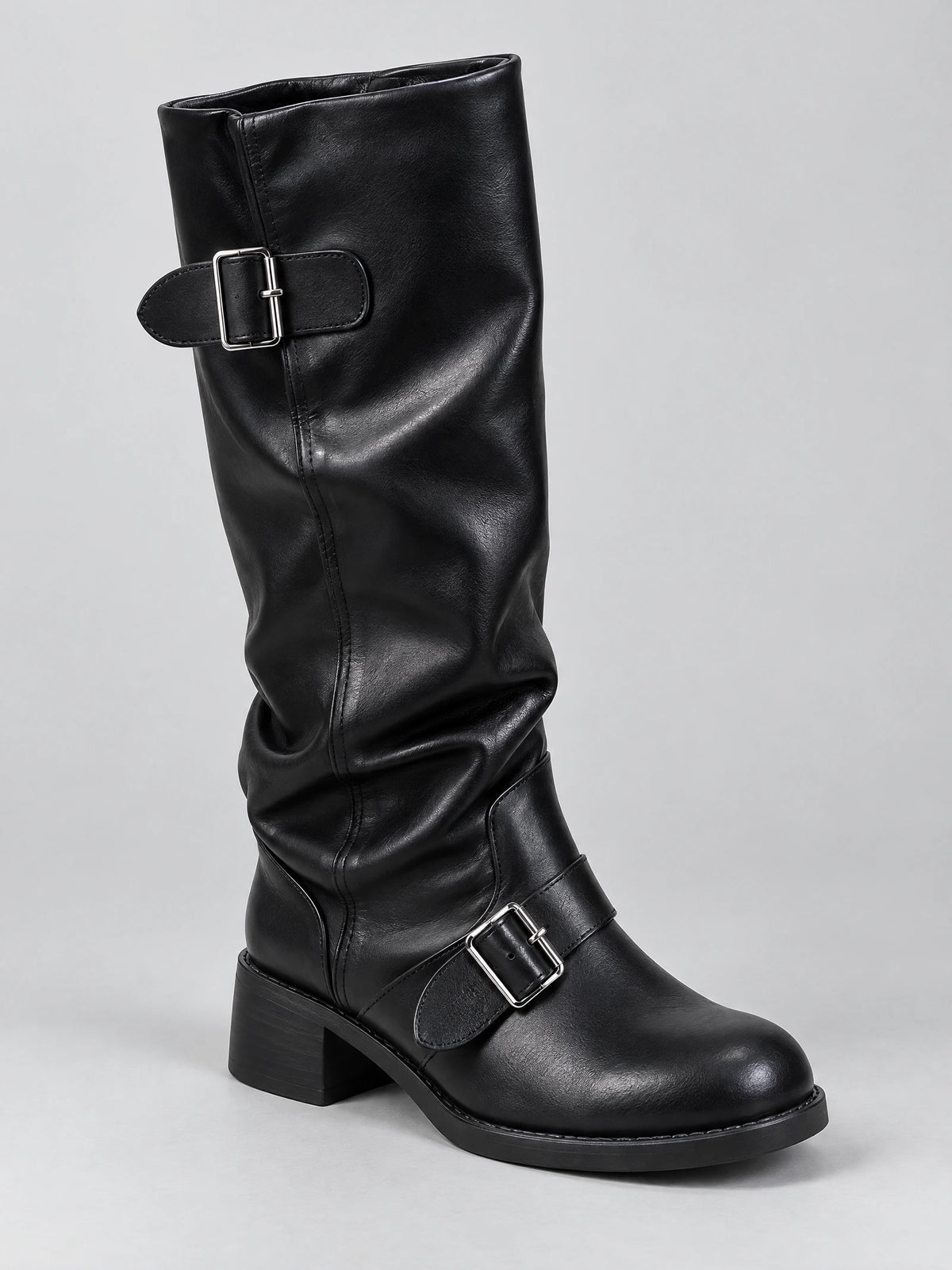 Black leather knee high chunky boot shown in three-quarter view with two buckle straps and a block platform heel.