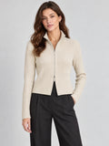 Front studio view of a model wearing a Beige ribbed Knit Cardigan with a stand collar and two-way zip closure.