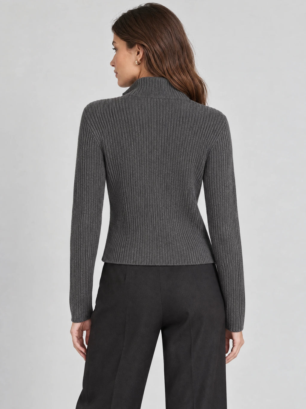 Back view of a model wearing a Gray ribbed Knit Cardigan with a high collar and long sleeves.