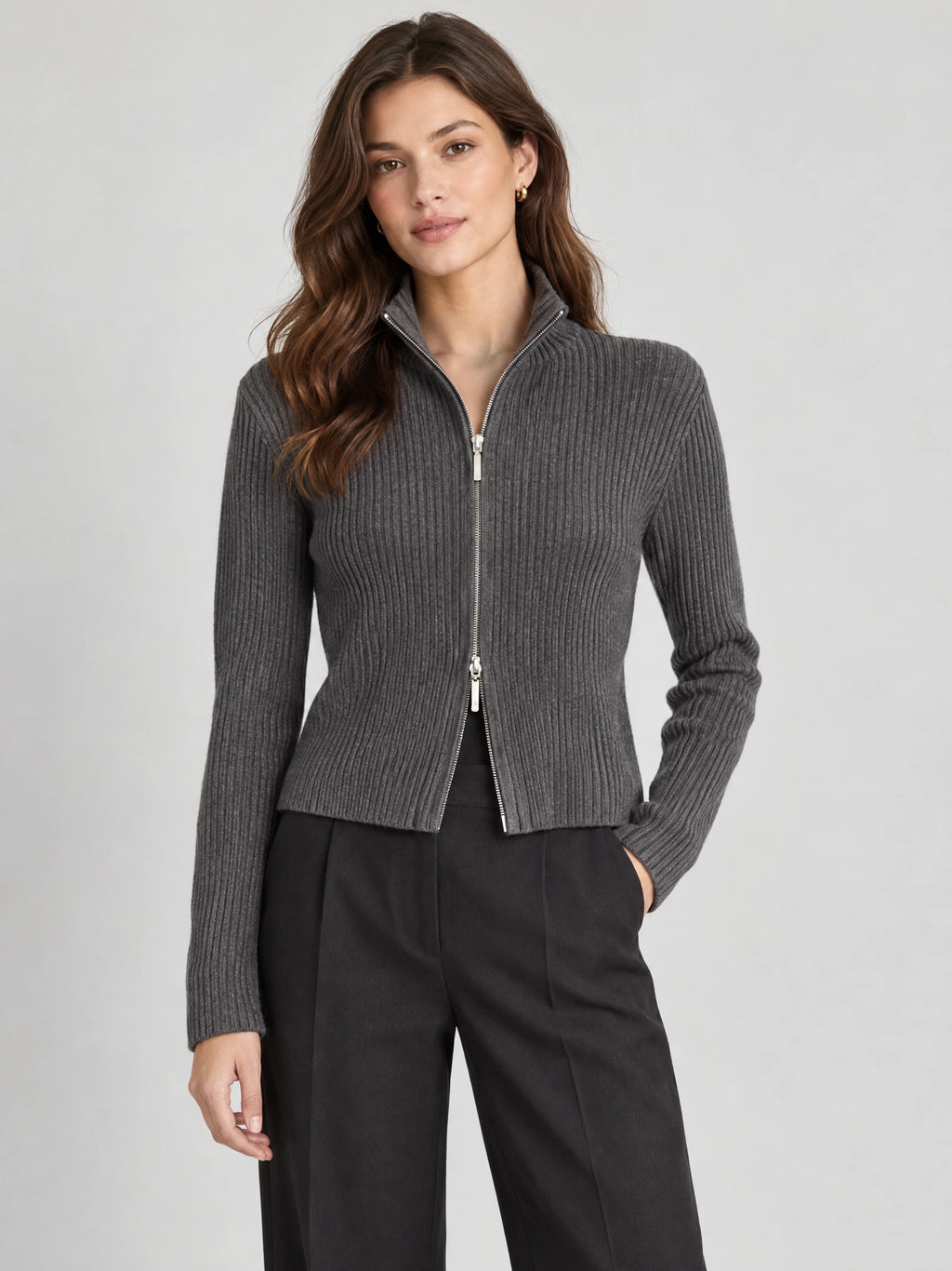 Model wearing a Gray ribbed Knit Cardigan with a high collar and two-way front zipper in a studio view.
