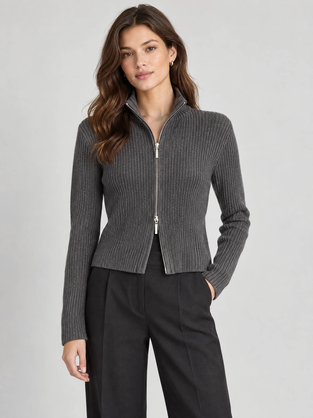 Model wearing a Gray ribbed Knit Cardigan with a high collar and two-way front zipper in a studio view.