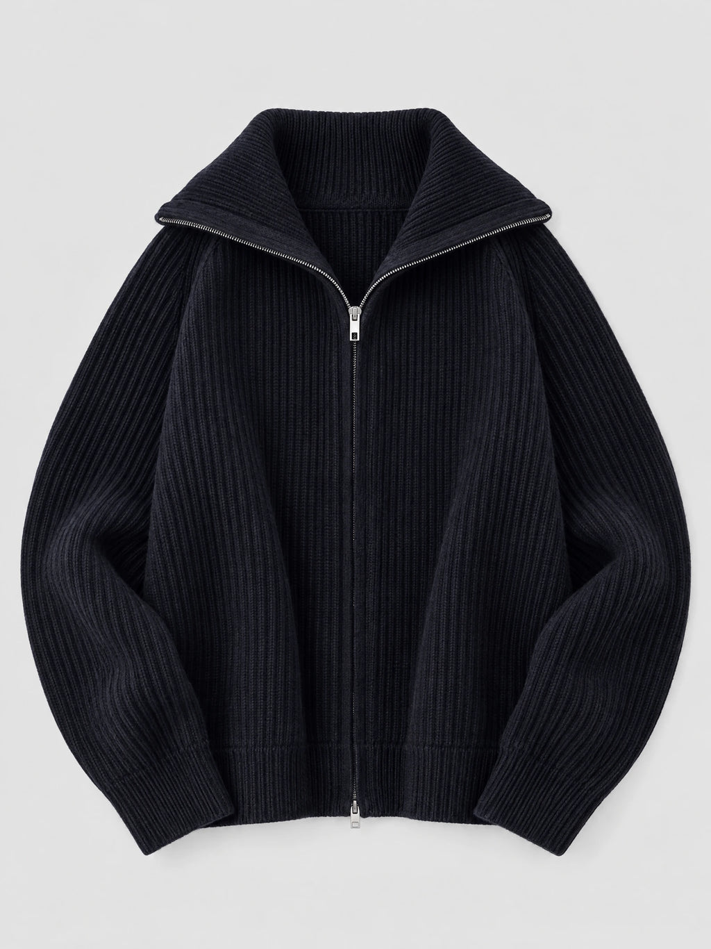 Navy ribbed knit turtle neck cardigan laid flat, featuring a full front zipper and folded high collar.