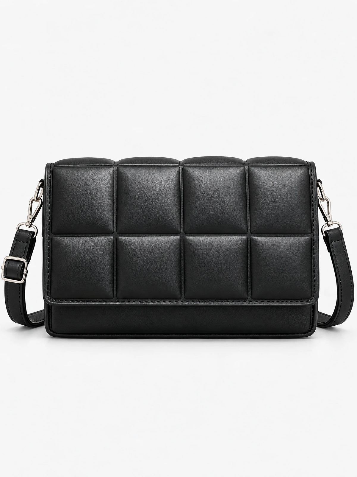 Black leather cross body bag shown from the front in a studio, with a padded grid panel and adjustable strap.