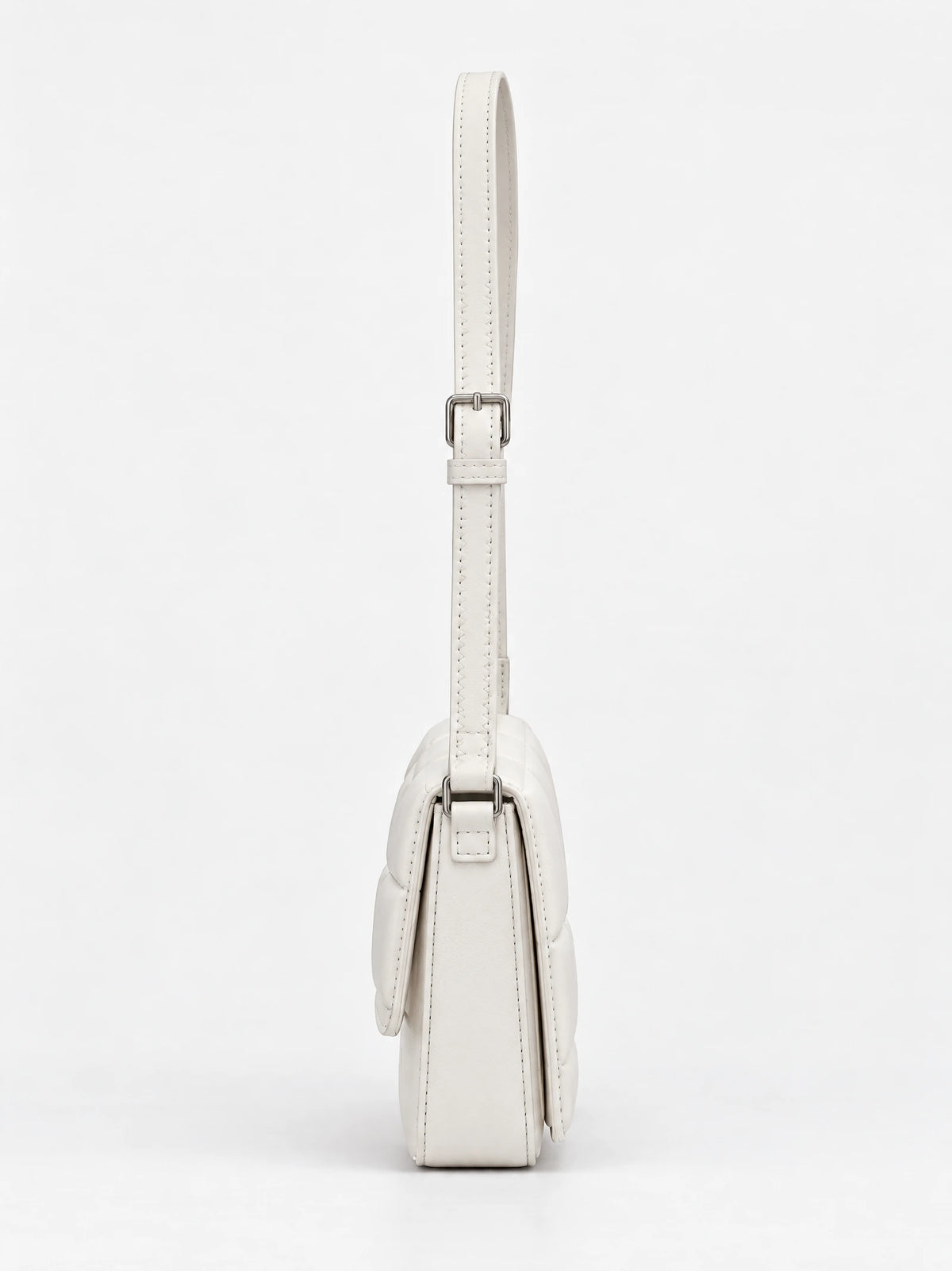 Side view of a White leather cross body bag with an adjustable stitched strap and buckle.