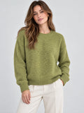 Model wearing a Green Women Mohair Winter Sweater with a crew neckline and ribbed cuffs in a front studio view.