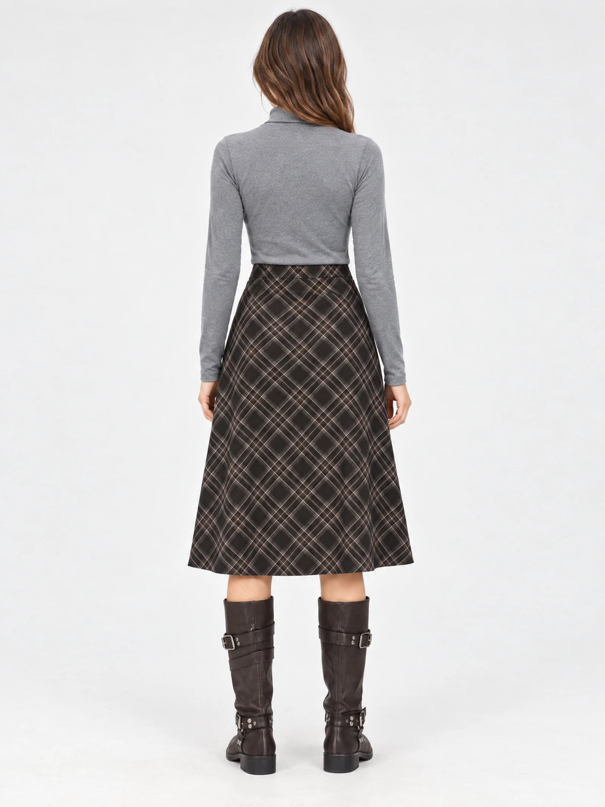Rear studio view of a model wearing a Brown checkered cotton pleated A-line midi skirt.