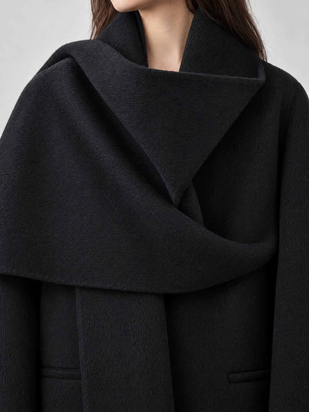 Close-up of the Black Scarf Collar Wool Coat Women, showing the textured wool and oversized draped scarf collar.