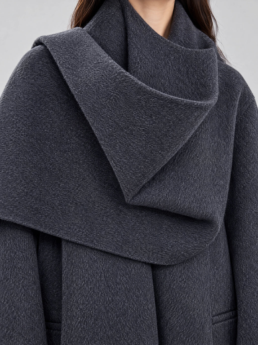 Close-up of the Gray Scarf Collar Wool Coat Women, highlighting its softly textured wool and oversized draped collar.