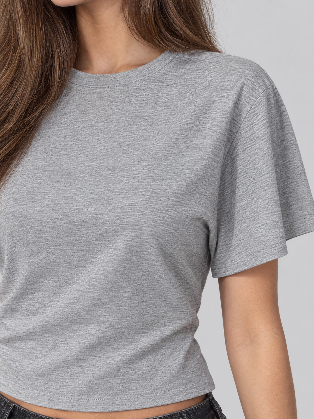 Close-up of the Gray cotton Waist Short Top showing its crew neckline, short sleeves, and cropped hem.