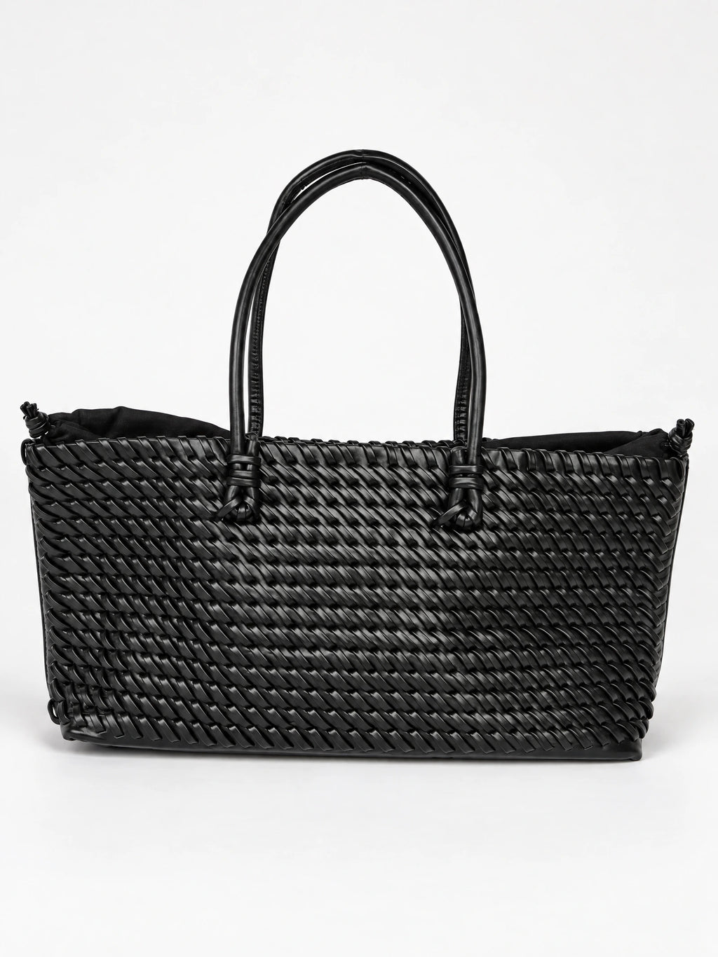 Black woven shoulder bag with braided texture and dual top handles, shown against a white studio background.